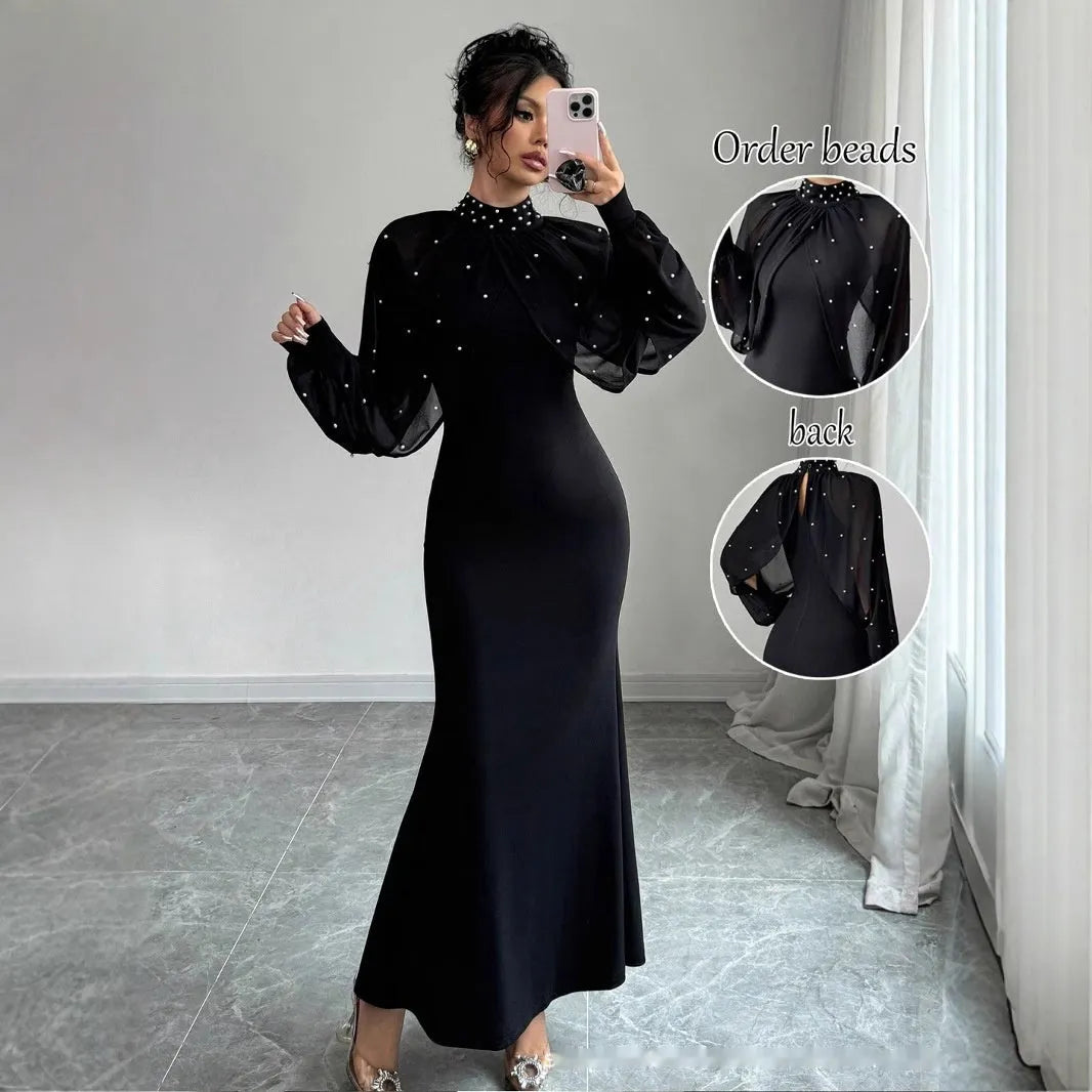 Robe longue manches lanterne en dentelle