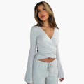 Womenâ€™s two-piece set with wrap top and trousers