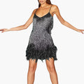 Womenâ€™s mini dress with spaghetti straps and fringe detailing