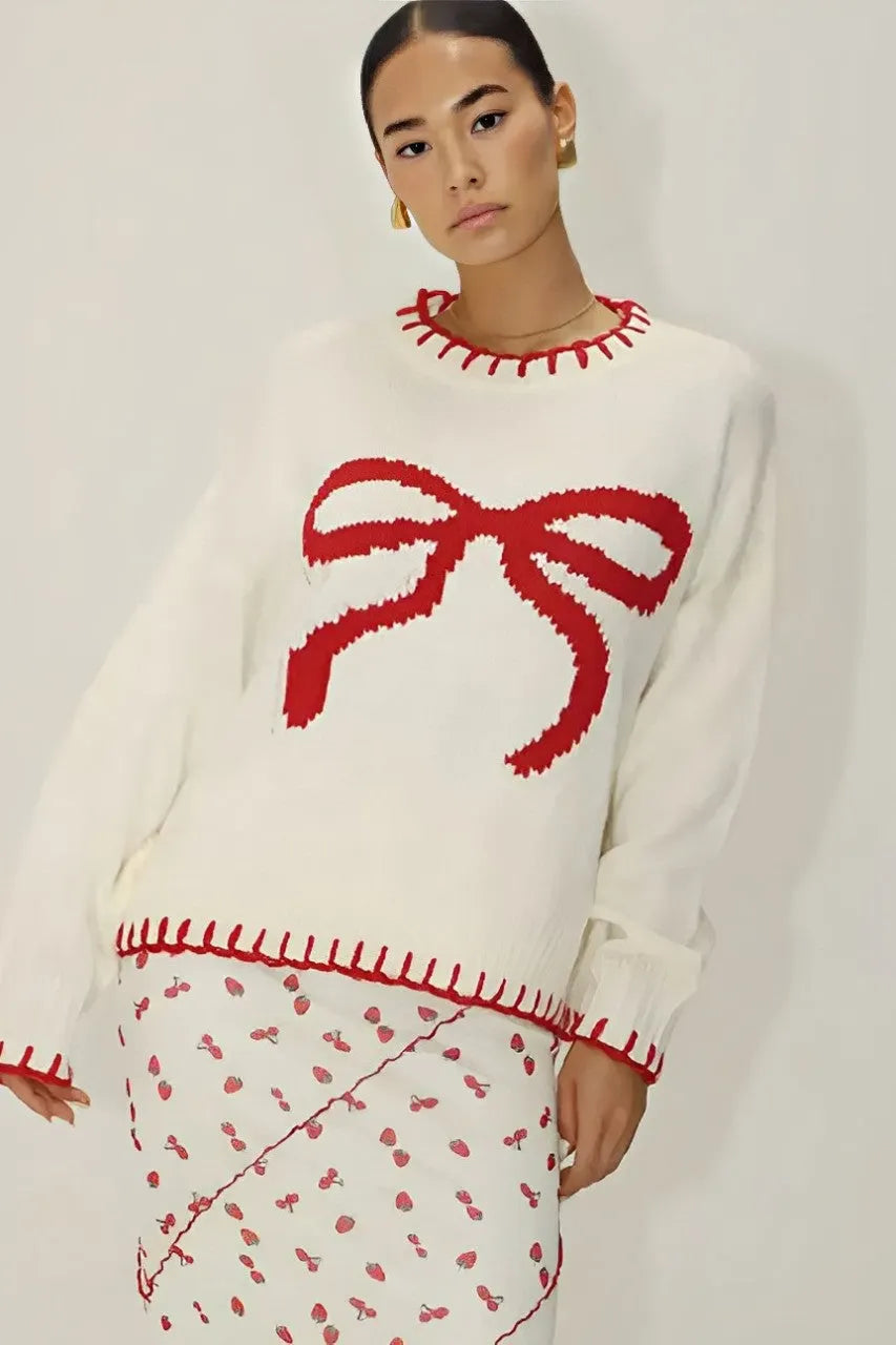 Verspielter Strick: Top mit roter Schleife