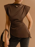 Top mit definierter Silhouette und Wickeldetail