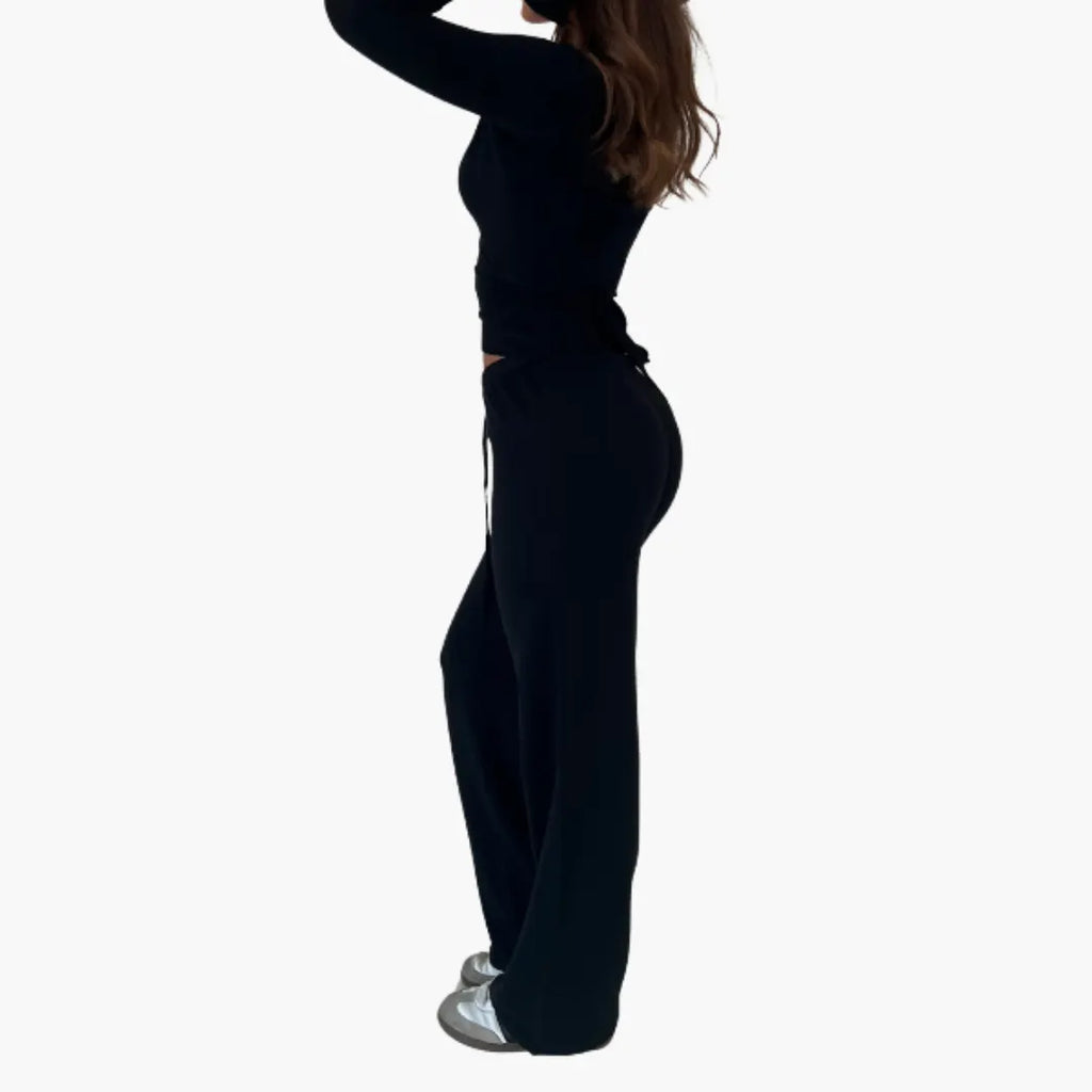 Womenâ€™s two-piece set with wrap top and trousers