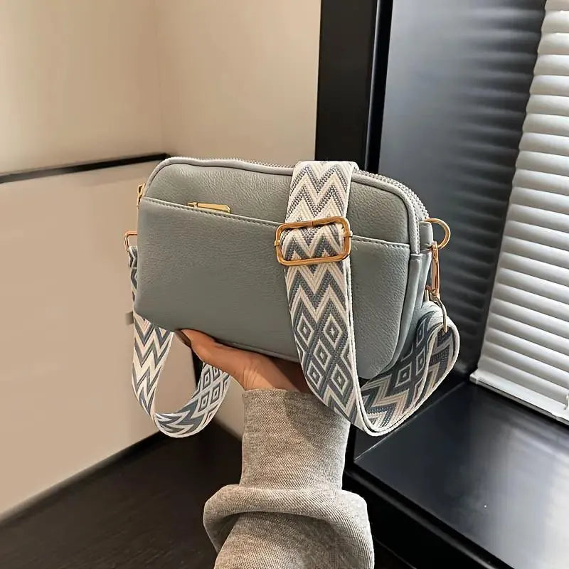 Moderne Crossbody Handtasche mit Musterriemen
