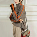 Geometrisch gestrickter Rollkragenpullover