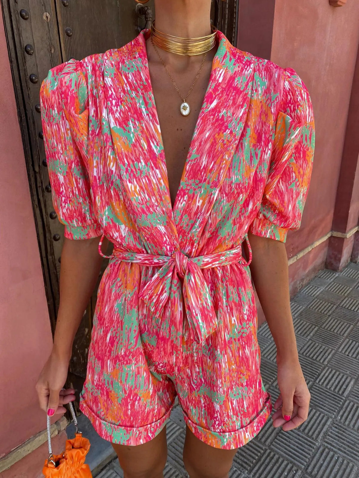 Abstrakter Print Romper mit Wickeldesign