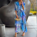 Anmutiges Kleid mit fließendem, mehrlagigem Rock