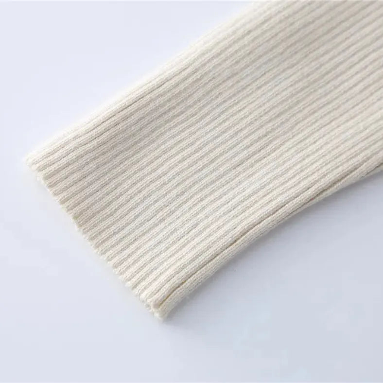 Elegant Knitted Women's Set with Turtleneck and Midi Skirt