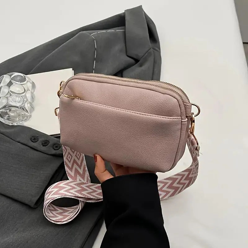 Moderne Crossbody Handtasche mit Musterriemen