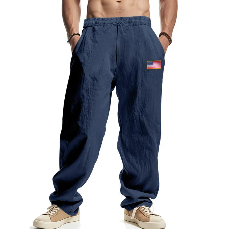 Herren nan lockere Baumwoll-Leinen Freizeithose mit elastischem Bund Kordelzug und dezenter Flaggen-Applikation