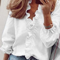 Bluse mit RÃ¼schen und V-Ausschnitt