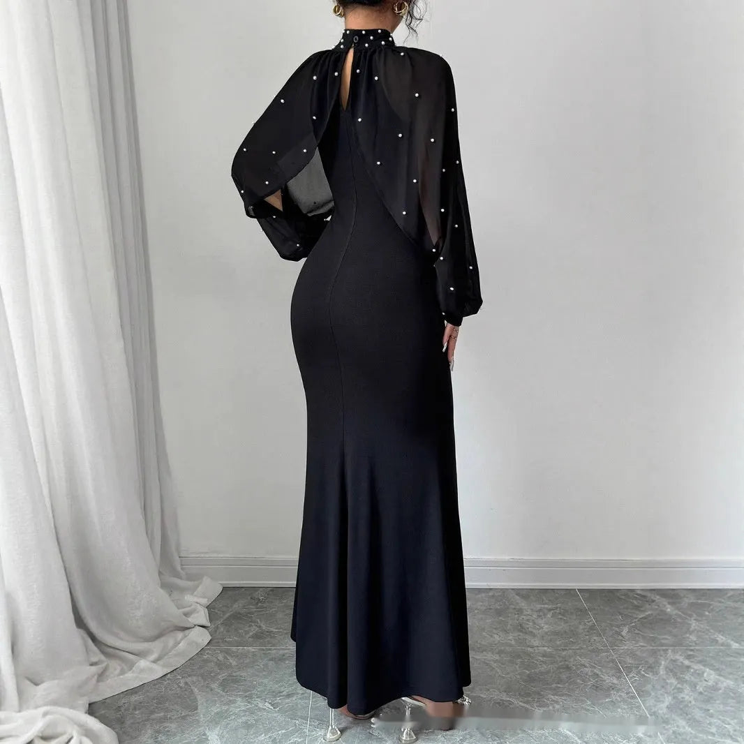 Robe longue manches lanterne en dentelle