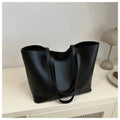 Elegant Women's Shoulder Bag with Sturdy Handles and Spacious Design