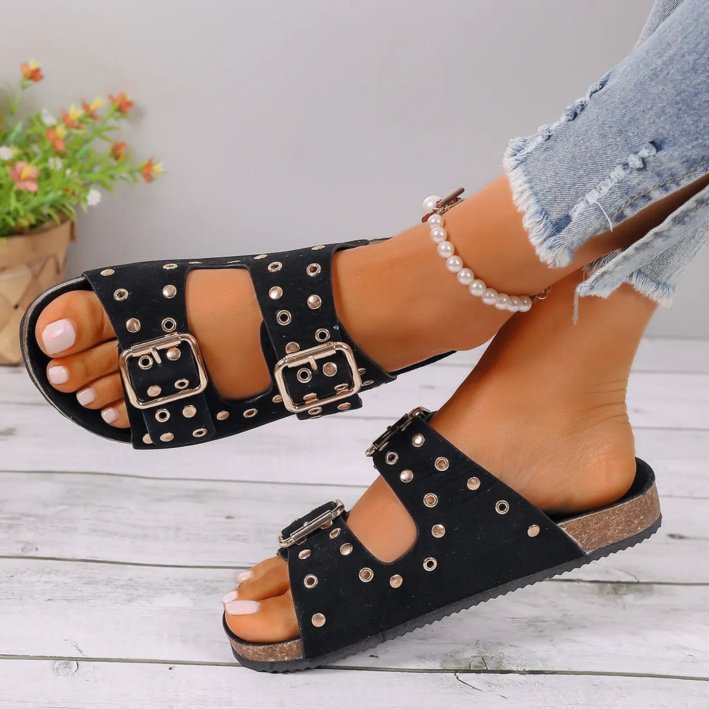 Flat sandal with rivet decoration