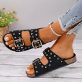 Flat sandal with rivet decoration