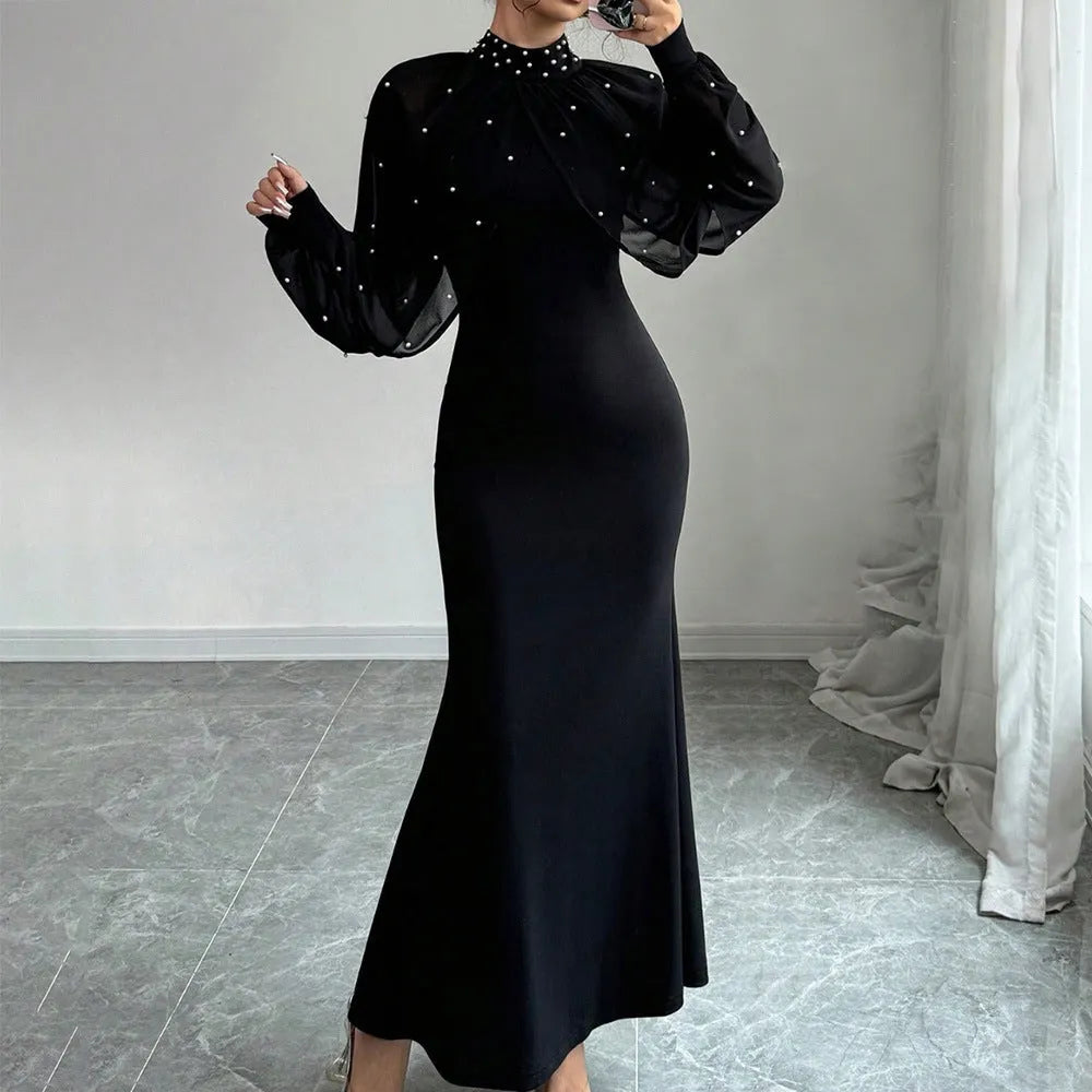 Robe longue manches lanterne en dentelle