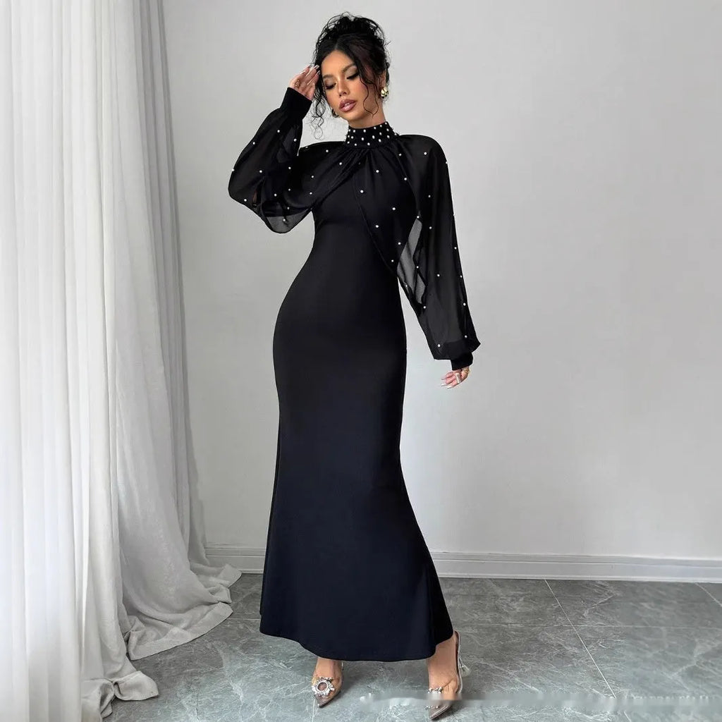 Robe longue manches lanterne en dentelle