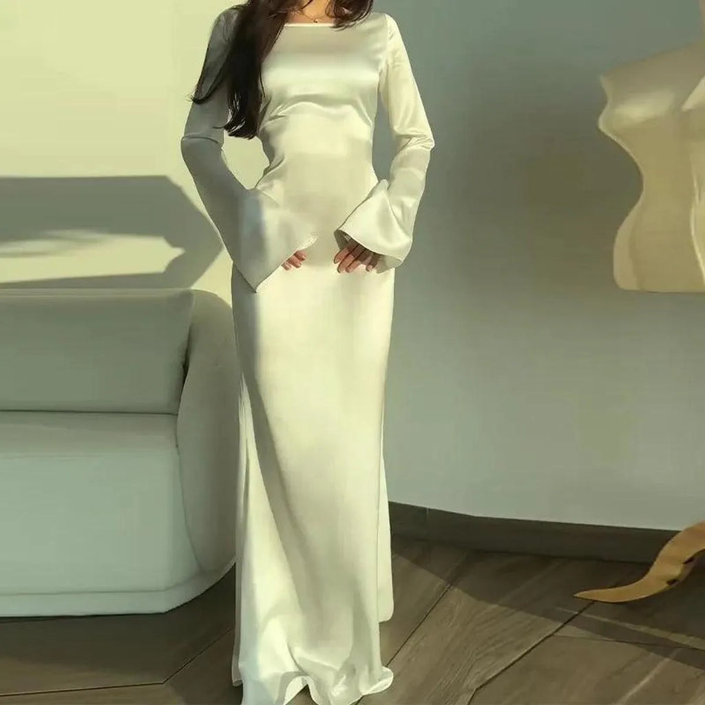 Lange Satijnen Avondjurk Met Flare Mouwen – Verfijnd, Elegant & Onweerstaanbaar Chic